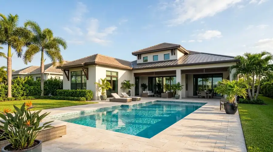 Paver pool deck with outdoor furniture in Naples, Florida